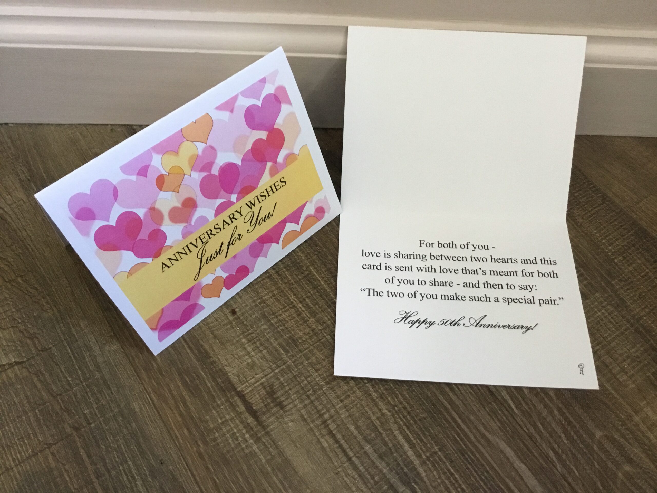 For both of you - love is sharing between two hearts and this card is sent with love that's meant for both of you to share - and then to say: "The two of you make such a special pair." Happy 50th Anniversary!